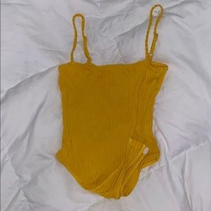 Yellow bodysuit
